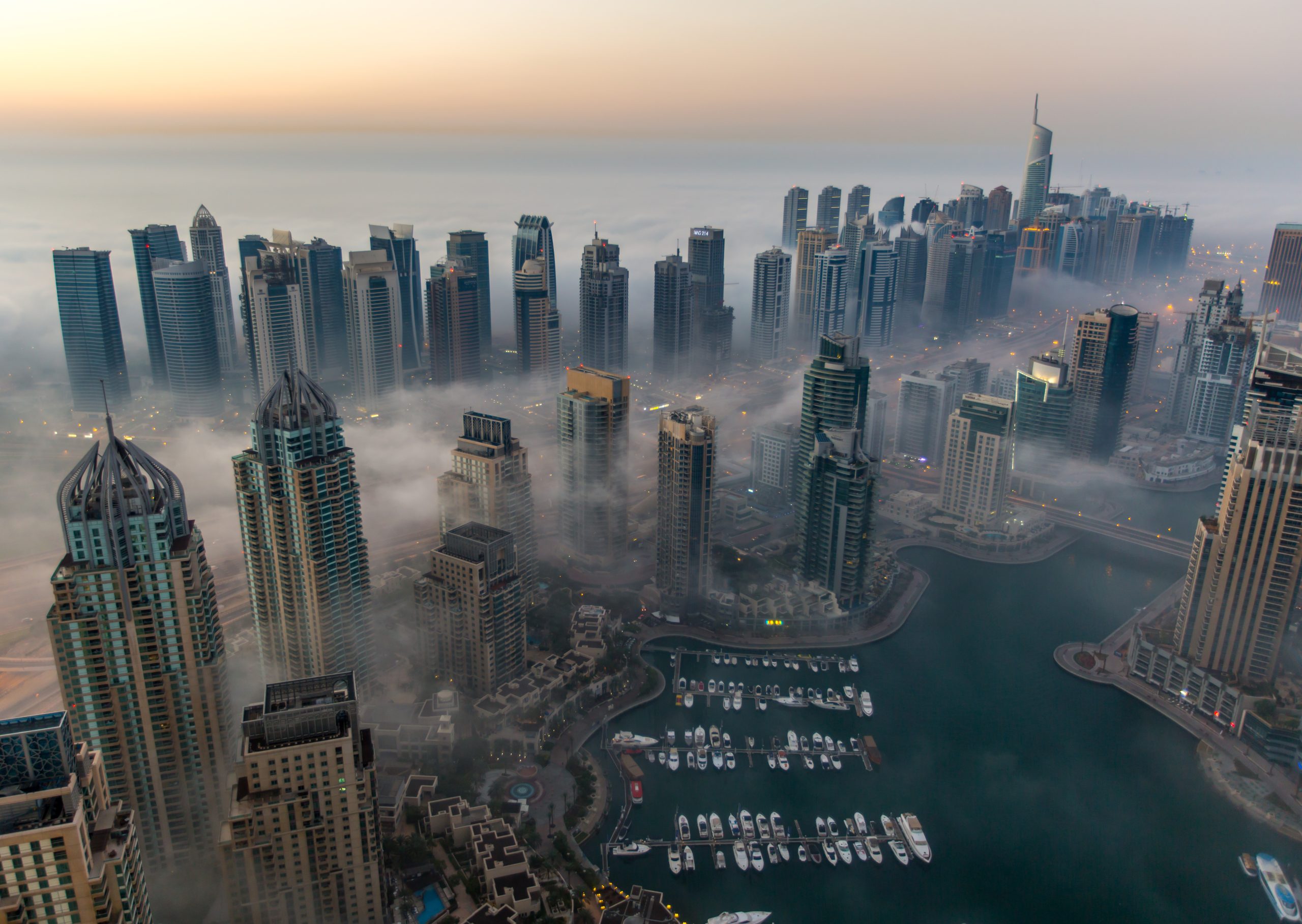 sunrise aerial view skyscraper foggy weather Dubai Marina